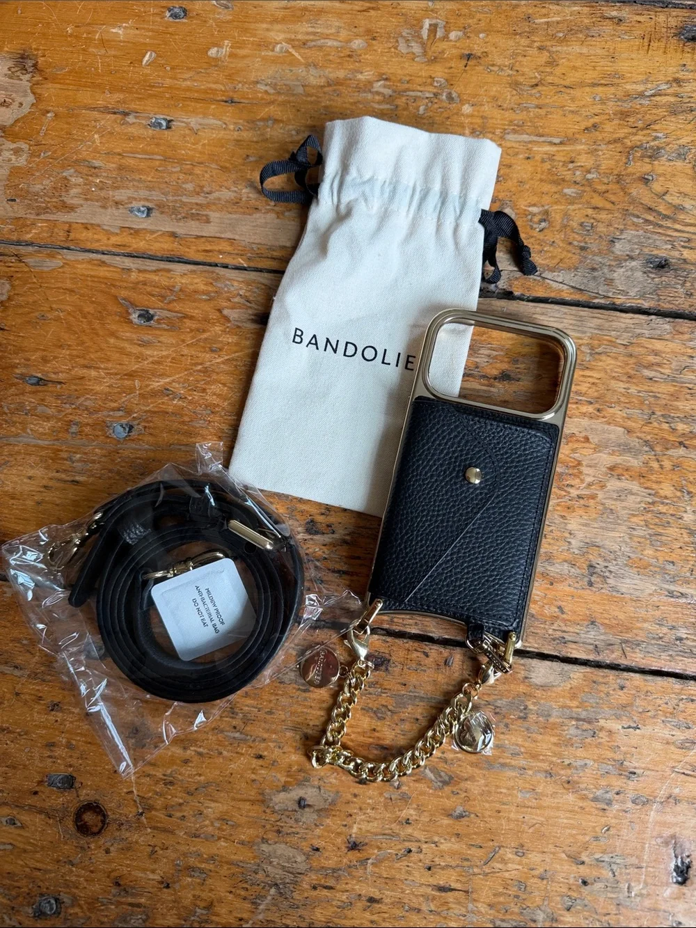 Bandolier Remi Black/Gold Leather iPhone 17 pro Crossbody with Charm Wristlet - Picture 1 of 3